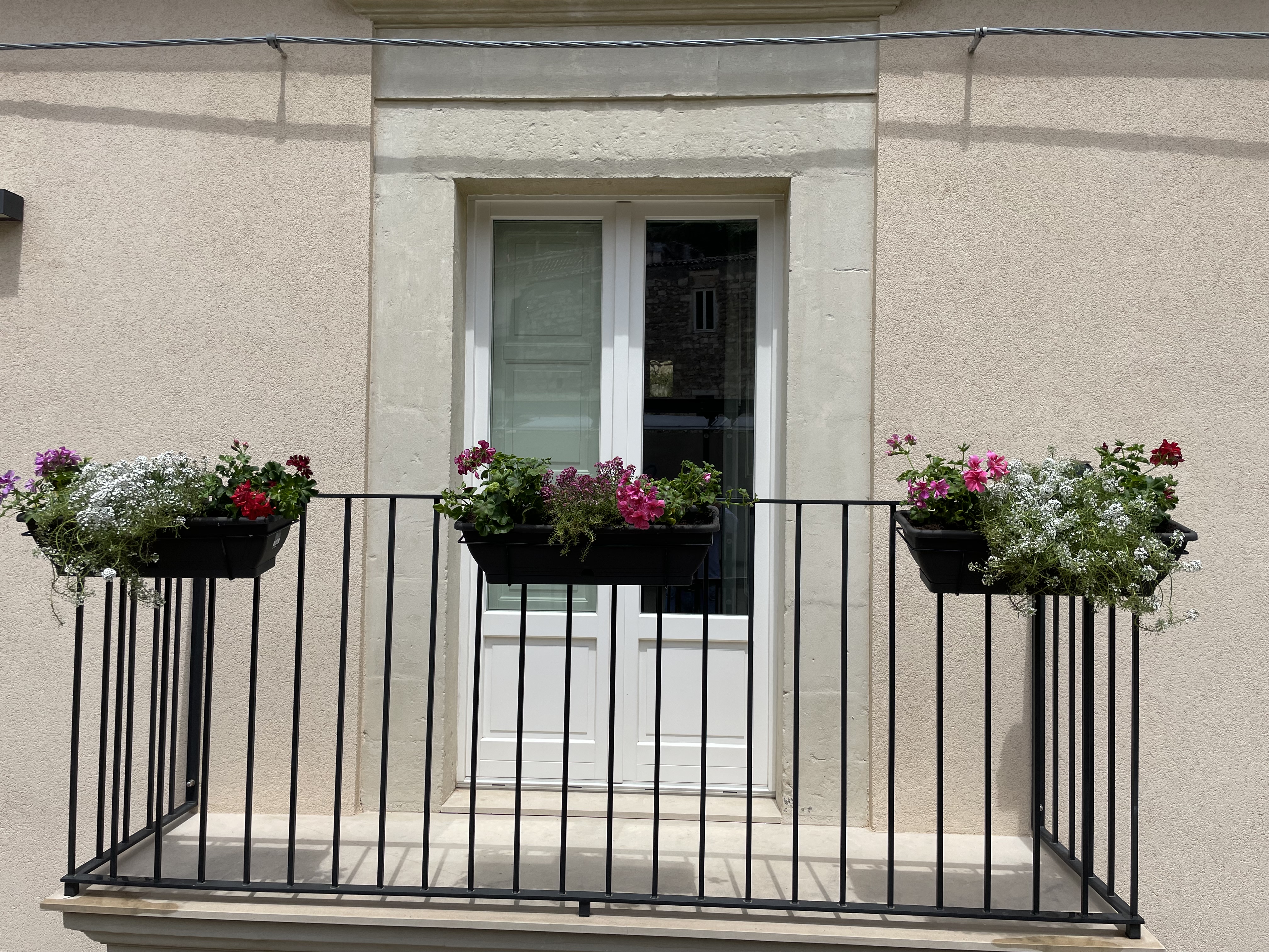 Hotel Prague Czechia nomad remote ca7d00a0-16ad-4ea6-841a-3014a686850a_7d309ea3e7cb49d29b0e08ad2d3ad50fBalcony.jpg