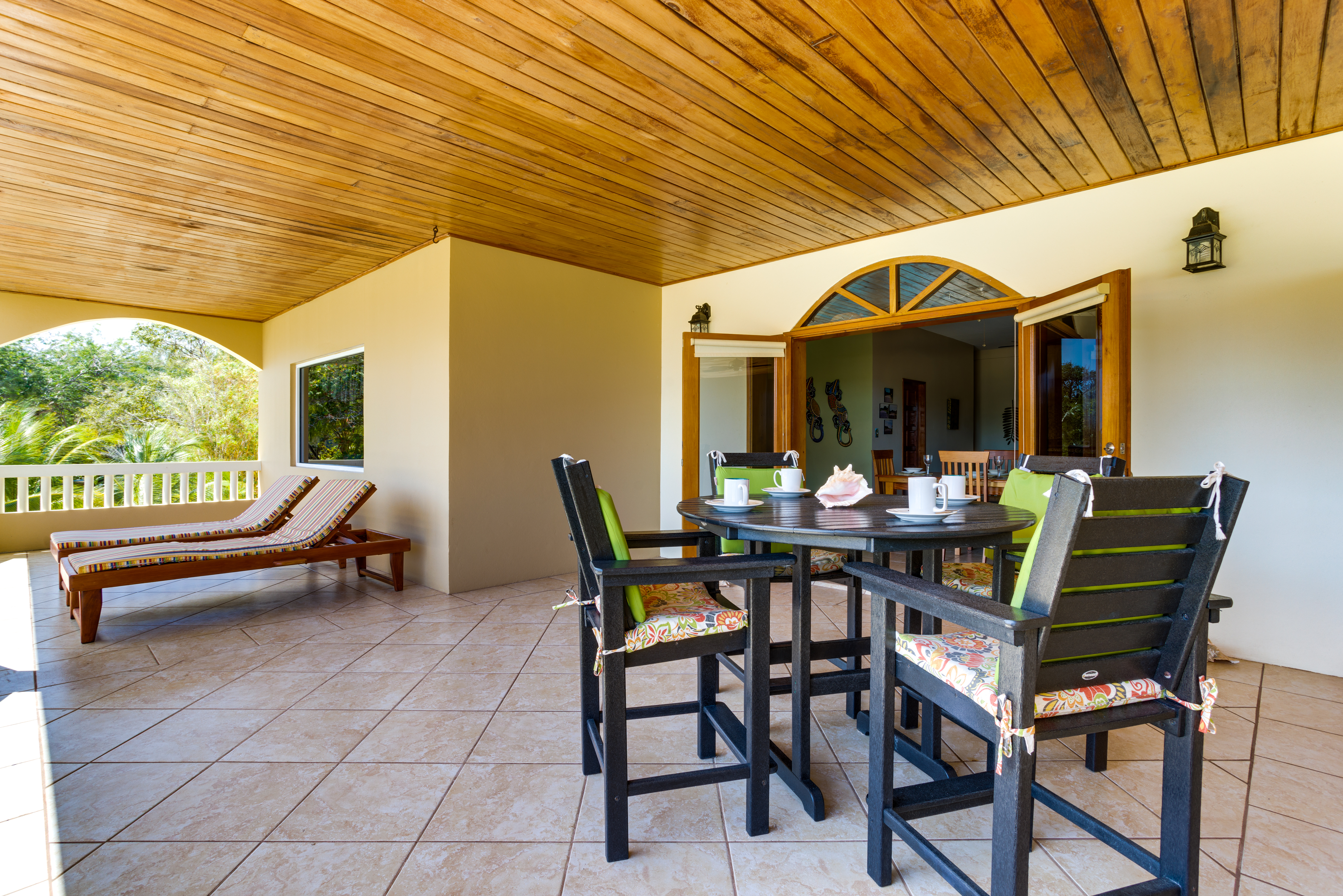 Hotel Placencia Belize nomad remote 935c073b-44d3-4402-93f7-93cc6f0d4c51_BalconytableandchairsA.jpg